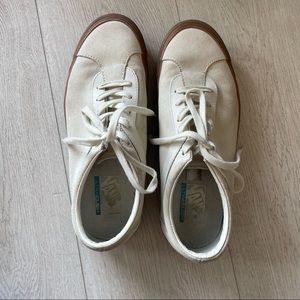 Men’s white lace up vans with brown soles